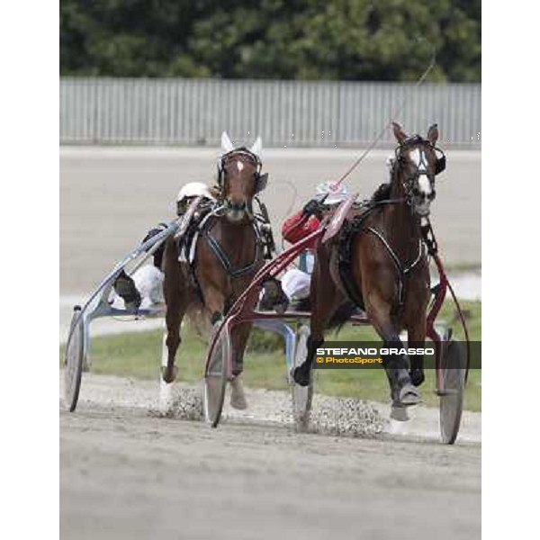 Pietro Gubellini and Oklahoma Ans lead the group and go to win the Gran Premio d\'Europa filly Milano - San Siro trot racecourse, 25th april 2012 ph.Stefano Grasso