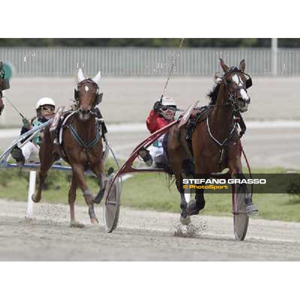 Pietro Gubellini and Oklahoma Ans lead the group and go to win the Gran Premio d\'Europa filly Milano - San Siro trot racecourse, 25th april 2012 ph.Stefano Grasso