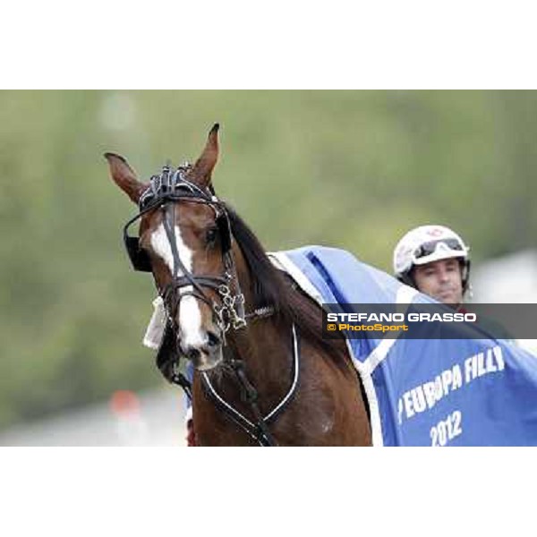 Pietro Gubellini and Oklahoma Ans parade after the victory in the Gran Premio d\'Europa filly Milano - San Siro trot racecourse, 25th april 2012 ph.Stefano Grasso
