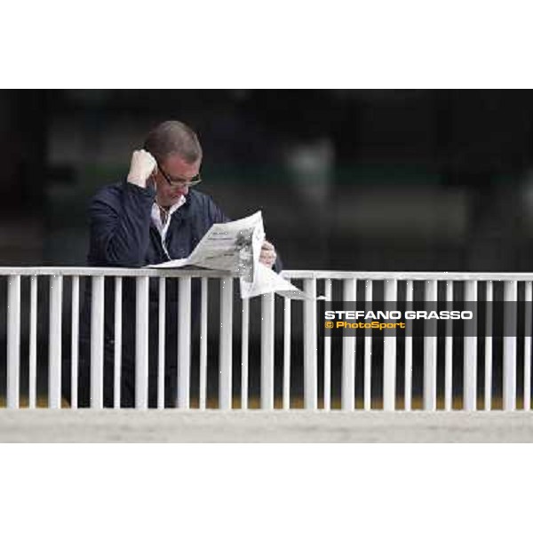 A racegoer at San Siro Milano - San Siro trot racecourse, 25th april 2012 ph.Stefano Grasso