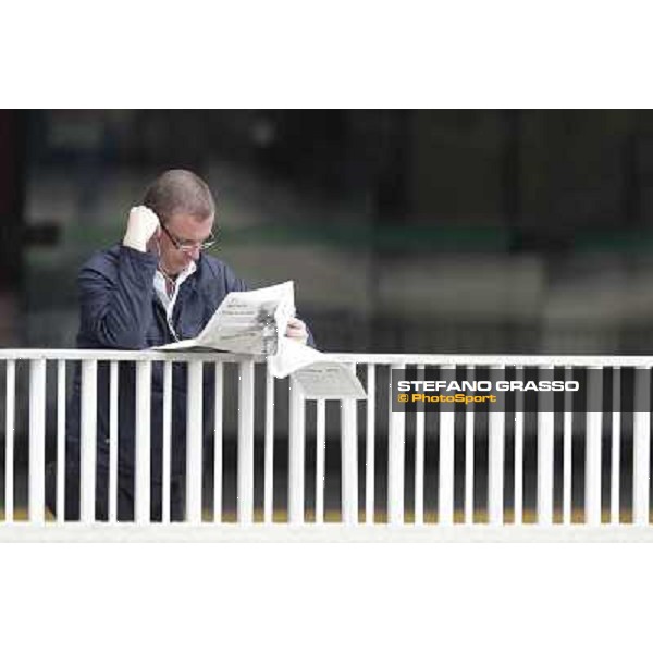 A racegoer at San Siro Milano - San Siro trot racecourse, 25th april 2012 ph.Stefano Grasso