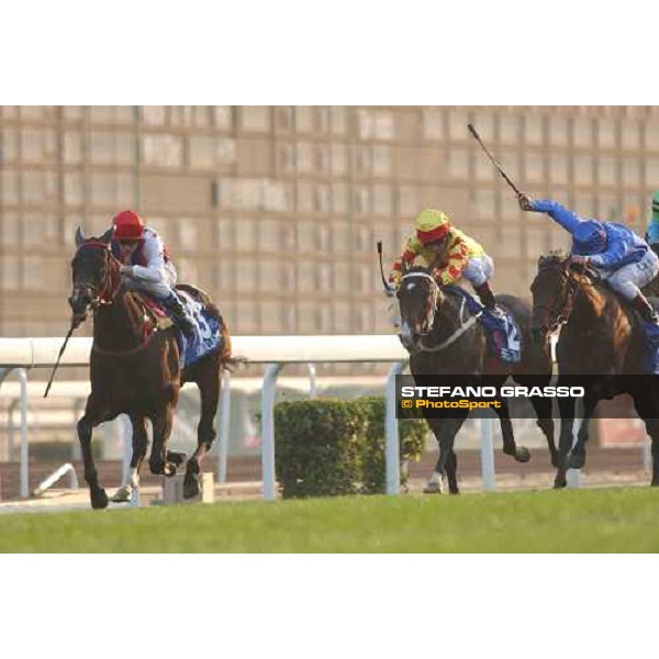 The Cathay Pacific Hong Kong Mile at few meters to the line The Duke ,Scintillation and Firebreak fight for the victory Sha Tin - Hong Kong 12th dec. 2004 ph. Stefano Grasso