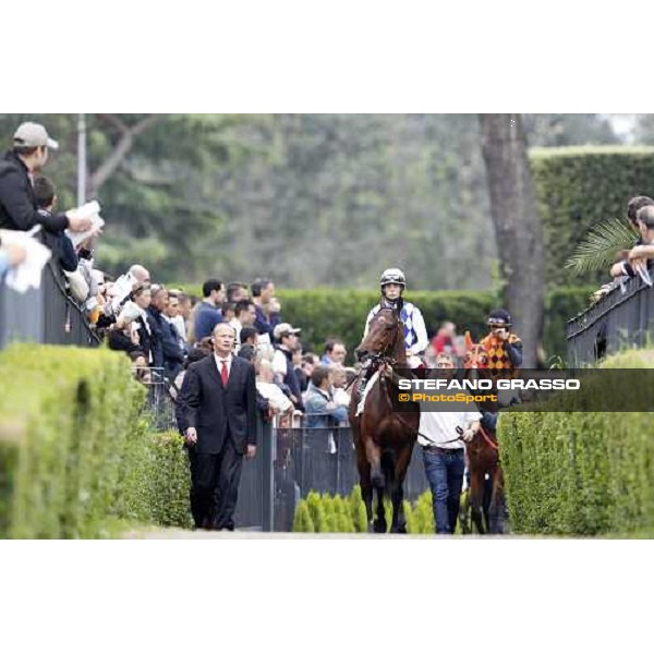 ing.Elio Pautasso opens the parade of Premio Parioli followed by Cristian Demuro on Art of Dreams Rome Capannelle racecourse, 29th april 2012 ph.Stefano Grasso