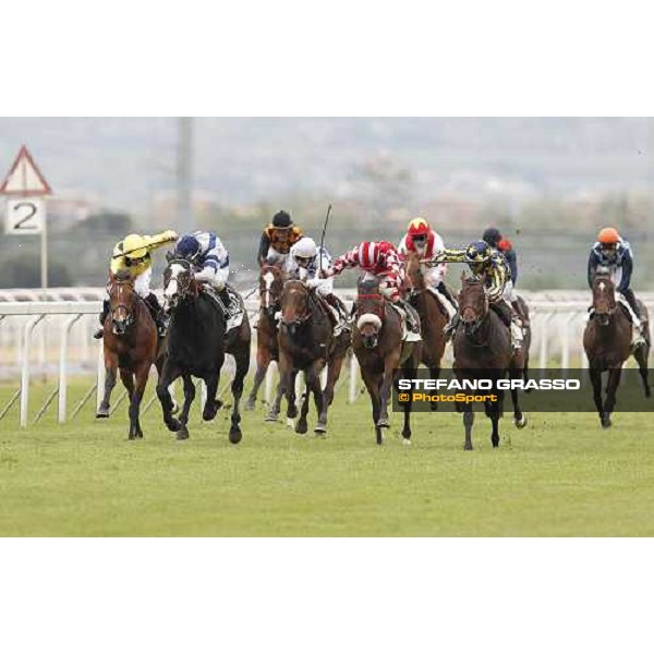 Fabio Branca on Malossol goes to win the Premio Parioli. Mirco Demuro on Vedelago is second. Neil Callan on Farraaj is third Rome Capannelle racecourse, 29th april 2012 ph.Stefano Grasso