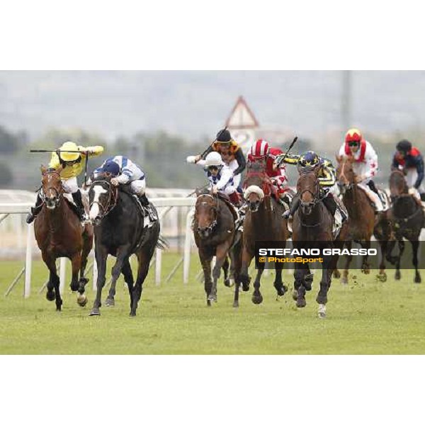 Fabio Branca on Malossol goes to win the Premio Parioli. Mirco Demuro on Vedelago is second. Neil Callan on Farraaj is third Rome Capannelle racecourse, 29th april 2012 ph.Stefano Grasso