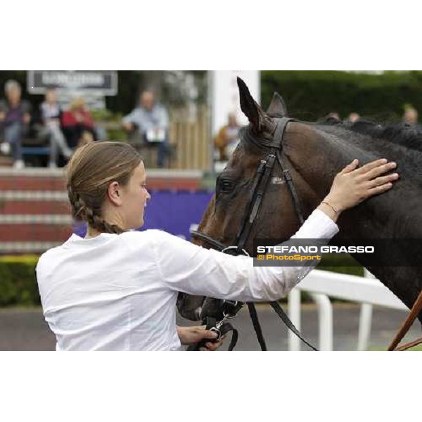 Caresses to Malossol from his groom Eva Gioli after winning the Premio Parioli Rome Capannelle racecourse, 29th april 2012 ph.Stefano Grasso