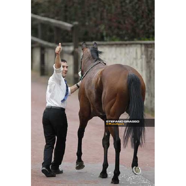 Jonathan Bacci celebrates returning home with Cherry Collect after winning the Premio Regina Elena. Rome Capannelle racecourse, 29th april 2012 ph.Stefano Grasso