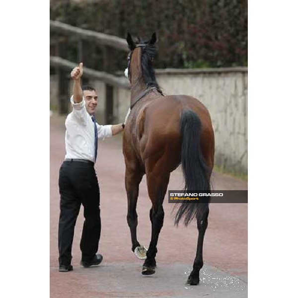 Jonathan Bacci celebrates returning home with Cherry Collect after winning the Premio Regina Elena. Rome Capannelle racecourse, 29th april 2012 ph.Stefano Grasso