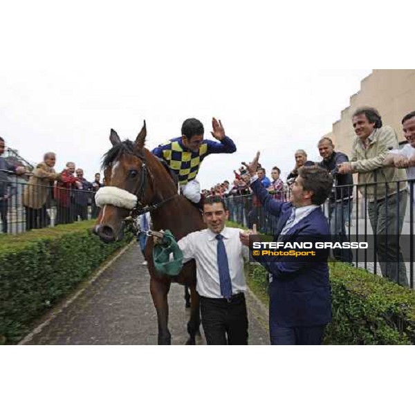 Stefano Botti congratulates with Fabio Branca returning home on Cherry Collect after winning the Premio Regina Elena Rome Capannelle racecourse, 29th april 2012 ph.Stefano Grasso