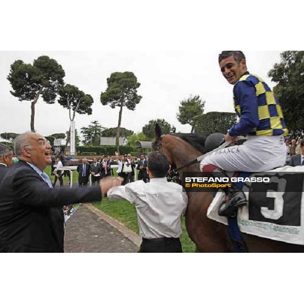 Felice Villa congratulates with Fabio Branca returning home on Cherry Collect after winning the Premio Regina Elena Rome Capannelle racecourse, 29th april 2012 ph.Stefano Grasso