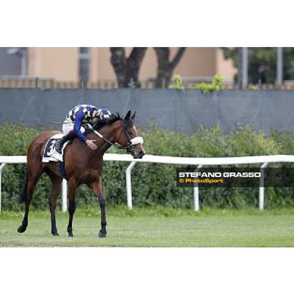 Fabio Branca thanks Cherry Collect after winning the Premio Regina Elena Rome - Capannelle racecourse, 29th apri l2012 ph.Stefano Grasso