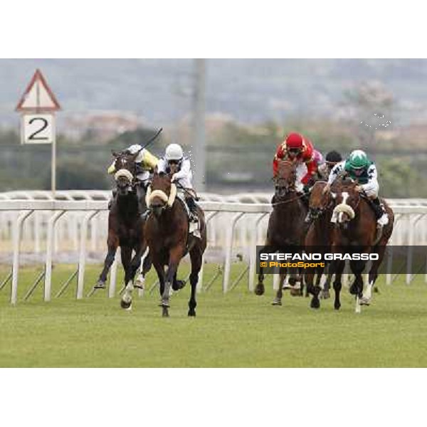 Mirco Demuro on Principe Adepto goes to win the Premio Signorino-Mem.Alessandro Lancellotti. Fabio Branca on Billy Budd is second Rome - Capannelle racecourse, 29th apri l2012 ph.Stefano Grasso