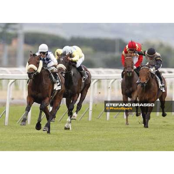 Mirco Demuro on Principe Adepto goes to win the Premio Signorino-Mem.Alessandro Lancellotti. Fabio Branca on Billy Budd is second Rome - Capannelle racecourse, 29th apri l2012 ph.Stefano Grasso