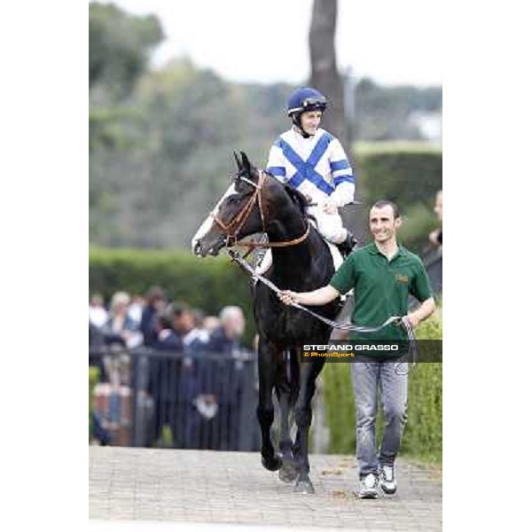 Mirco Demuro on Vedelago enters the track before the start of the Premio Parioli Rome - Capannelle racecourse, 29th april 2012 ph.Stefano Grasso