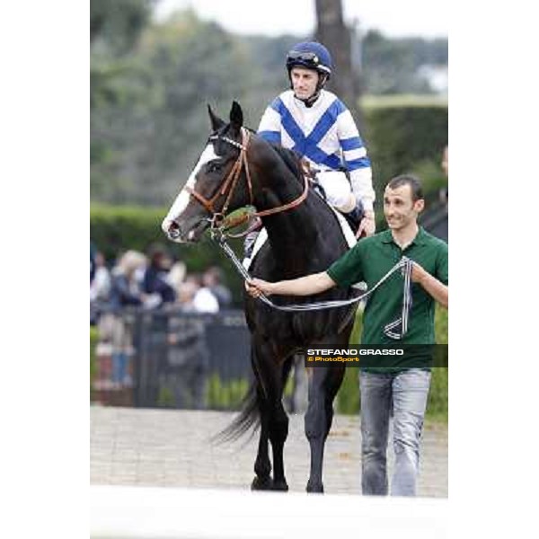 Mirco Demuro on Vedelago enters the track before the start of the Premio Parioli Rome - Capannelle racecourse, 29th april 2012 ph.Stefano Grasso