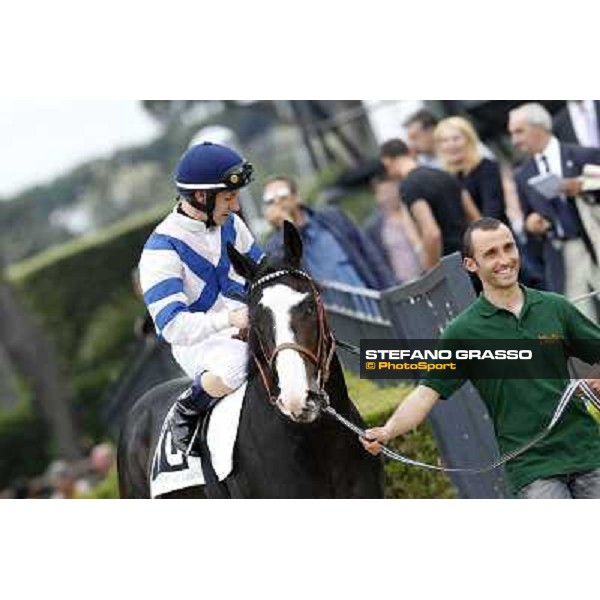 Mirco Demuro on Vedelago enters the track before the start of the Premio Parioli Rome - Capannelle racecourse, 29th april 2012 ph.Stefano Grasso