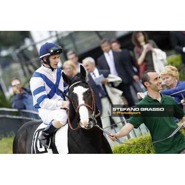 Mirco Demuro on Vedelago enters the track before the start of the Premio Parioli Rome - Capannelle racecourse, 29th april 2012 ph.Stefano Grasso