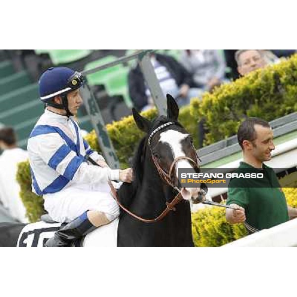 Mirco Demuro on Vedelago enters the track before the start of the Premio Parioli Rome - Capannelle racecourse, 29th april 2012 ph.Stefano Grasso