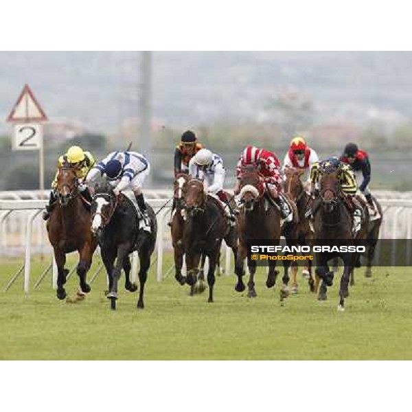 Fabio Branca on Malossol goes to win the Premio Parioli. Mirco Demuro on Vedelago is second, Neil Callan on Farraaj is third Rome - Capannelle racecourse, 29th april 2012 ph.Stefano Grasso