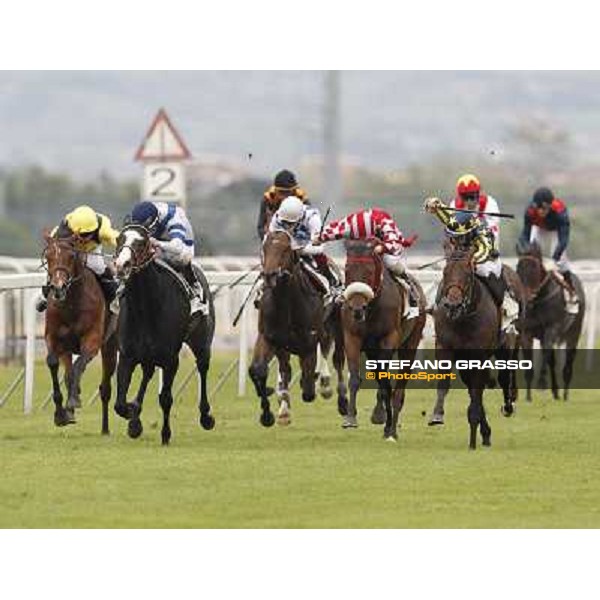 Fabio Branca on Malossol goes to win the Premio Parioli. Mirco Demuro on Vedelago is second, Neil Callan on Farraaj is third Rome - Capannelle racecourse, 29th april 2012 ph.Stefano Grasso