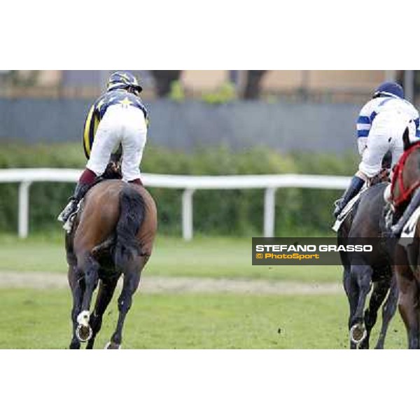 Fabio Branca on Malossol and Mirco Demuro on Vedelagoafter the finish in the Premio Parioli. Mirco Rome - Capannelle racecourse, 29th april 2012 ph.Stefano Grasso