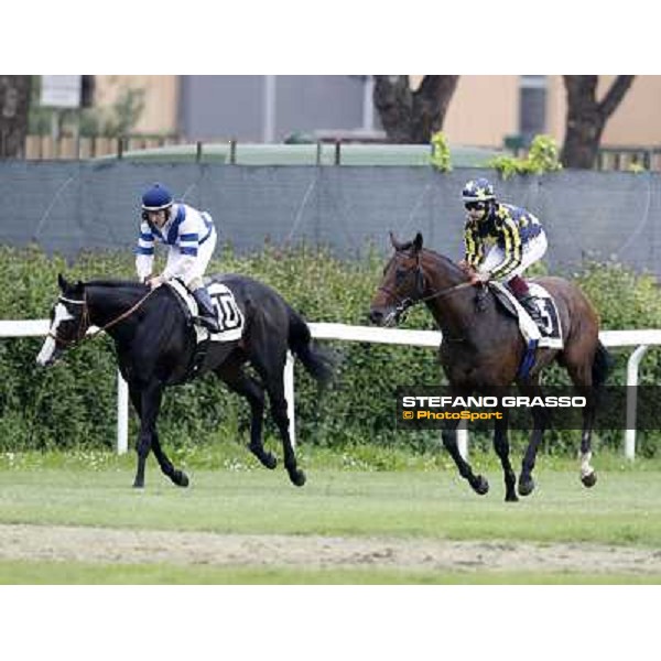 Fabio Branca on Malossol and Mirco Demuro on Vedelagoafter the finish in the Premio Parioli. Mirco Rome - Capannelle racecourse, 29th april 2012 ph.Stefano Grasso