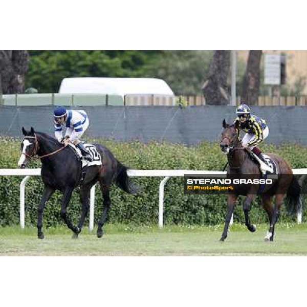 Fabio Branca on Malossol and Mirco Demuro on Vedelagoafter the finish in the Premio Parioli. Mirco Rome - Capannelle racecourse, 29th april 2012 ph.Stefano Grasso