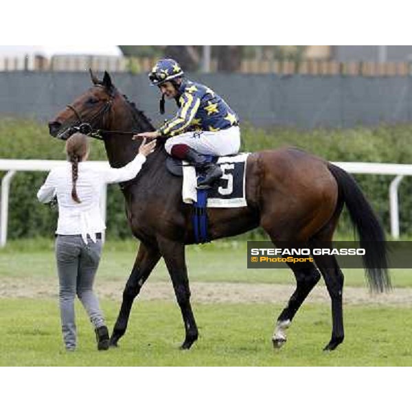 Fabio Branca celebrates on Malossol after winning the Premio Parioli. Rome - Capannelle racecourse, 29th april 2012 ph.Stefano Grasso