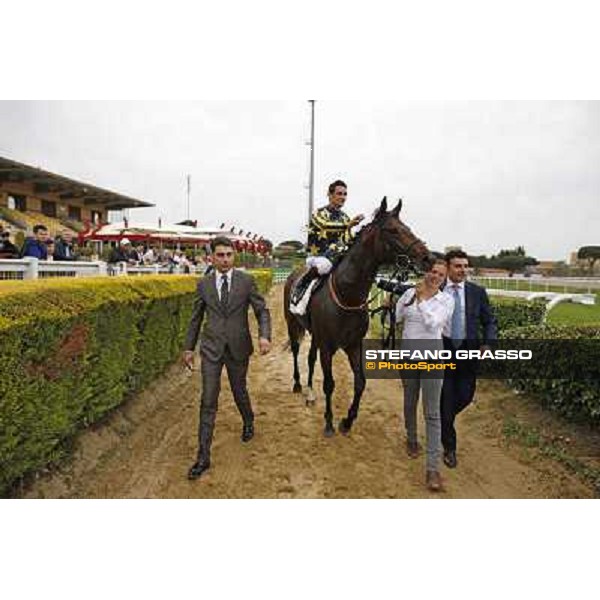 Fabio Branca on Malossol with Alessandro and Endo Botti returns home after winning the Premio Parioli Rome - Capannelle racecourse, 29th april 2012 ph.Stefano Grasso