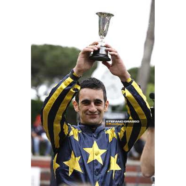 Fabio Branca stands the cup after winning the Premio Parioli Rome - Capannelle racecourse, 29th april 2012 ph.Stefano Grasso