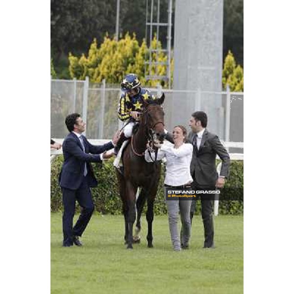 Alessandro and Endo Botti congratulate with Fabio Branca on Malossol after winning the Premio Parioli. Rome - Capannelle racecourse, 29th april 2012 ph.Stefano Grasso