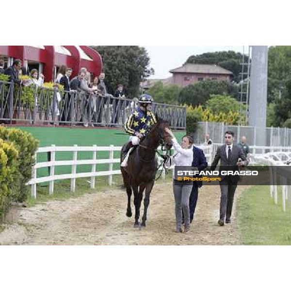 Alessandro and Endo Botti congratulate with Fabio Branca on Malossol after winning the Premio Parioli. Rome - Capannelle racecourse, 29th april 2012 ph.Stefano Grasso