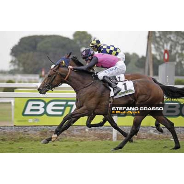 Robert Havlin on Feuerblitz goes to win the 129° Derby Italiano Better beating Umberto Rispoli on Wild Wolf Roma - Capannelle racecourse, 20th may 2012 ph.Stefano Grasso