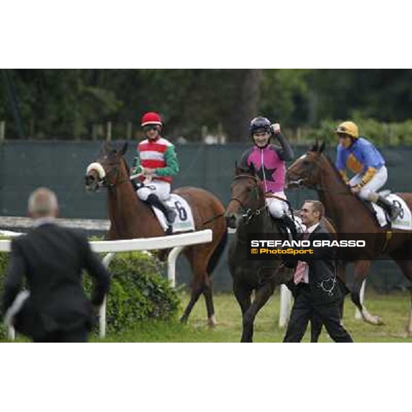 Robert Havlin on Feuerblitz with his groom and trainer Figge exult after the victory 129° Derby Italiano Better Roma - Capannelle racecourse, 20th may 2012 ph.Stefano Grasso