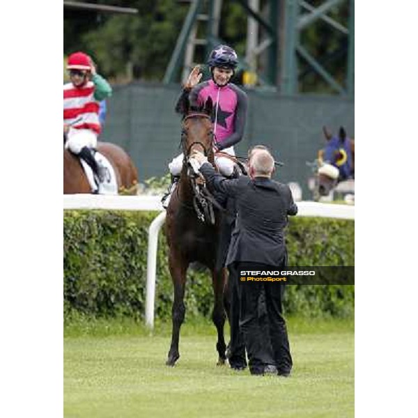 Robert Havlin on Feuerblitz with his groom and trainer Figge exult after the victory 129° Derby Italiano Better Roma - Capannelle racecourse, 20th may 2012 ph.Stefano Grasso