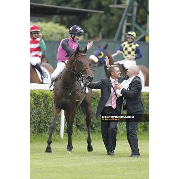 Robert Havlin on Feuerblitz with his groom and trainer Figge exult after the victory 129° Derby Italiano Better Roma - Capannelle racecourse, 20th may 2012 ph.Stefano Grasso