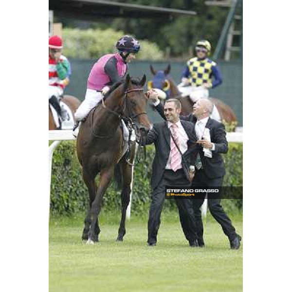 Robert Havlin on Feuerblitz with his groom and trainer Figge exult after the victory 129° Derby Italiano Better Roma - Capannelle racecourse, 20th may 2012 ph.Stefano Grasso