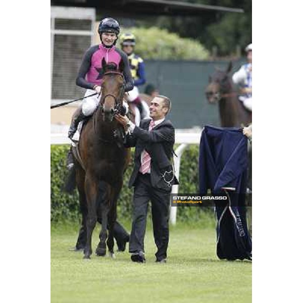 Robert Havlin on Feuerblitz with his groom and trainer Figge exult after the victory 129° Derby Italiano Better Roma - Capannelle racecourse, 20th may 2012 ph.Stefano Grasso