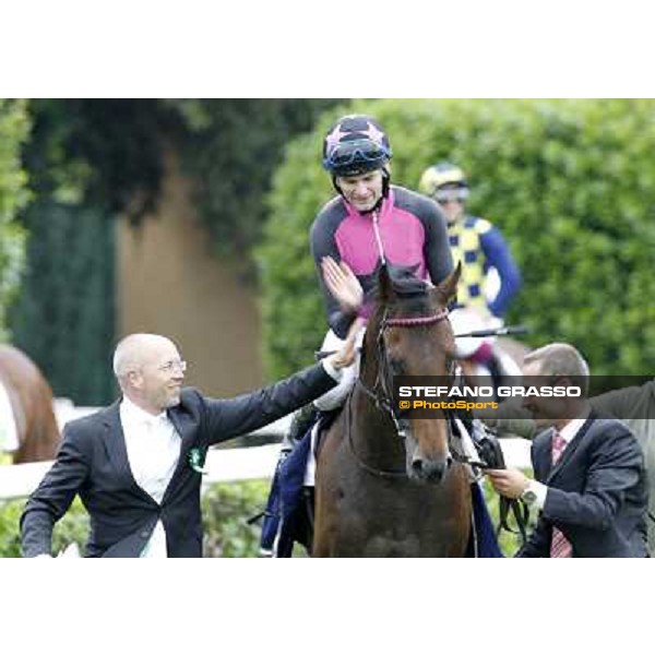 Robert Havlin on Feuerblitz with his groom and trainer Figge exult after the victory 129° Derby Italiano Better Roma - Capannelle racecourse, 20th may 2012 ph.Stefano Grasso