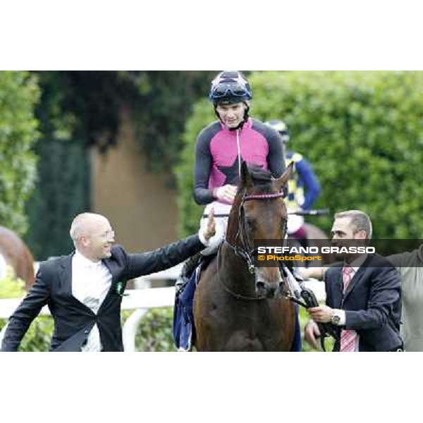 Robert Havlin on Feuerblitz with his groom and trainer Figge exult after the victory 129° Derby Italiano Better Roma - Capannelle racecourse, 20th may 2012 ph.Stefano Grasso