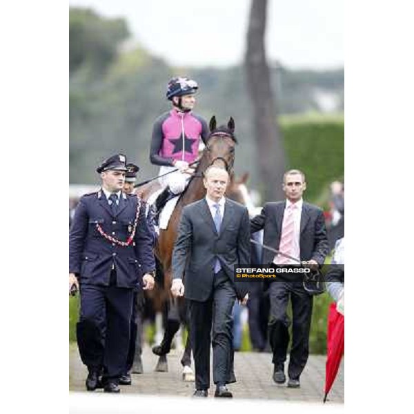 Ing.Elio Pautasso opens the parade followed by Feuerblitz 129° Derby Italiano Better Roma - Capannelle racecourse, 20th may 2012 ph.Stefano Grasso