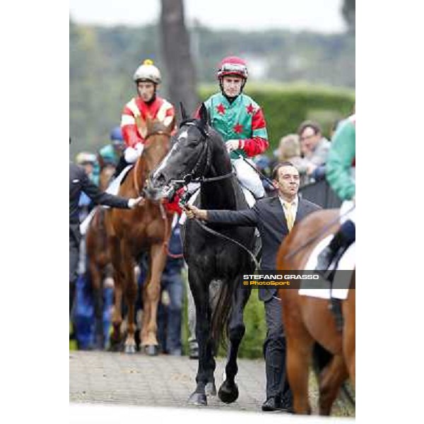 Mirco Demuro on Sopran Montieri enters the track 129° Derby Italiano Better Roma - Capannelle racecourse, 20th may 2012 ph.Stefano Grasso