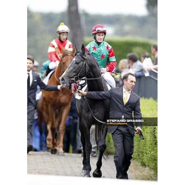 Mirco Demuro on Sopran Montieri enters the track 129° Derby Italiano Better Roma - Capannelle racecourse, 20th may 2012 ph.Stefano Grasso