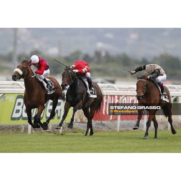 Cristian Demuro on Lake Drop goes to win the Premio Carlo D\'Alessio. Frankie Dettori on Frankenstein is second.Carlo Fiocchi on Branderburgo is third Roma - Capannelle racecourse, 20th may 2012 ph.Stefano Grasso