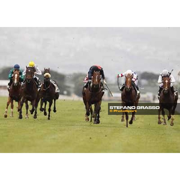 Carlo Fiocchi on United Color wins the Premio Tudini.Cristian Demuro on Traditional Chic is second.Mirco Demuro on Pandar is third Roma - Capannelle racecourse, 20th may 2012 ph.Stefano Grasso