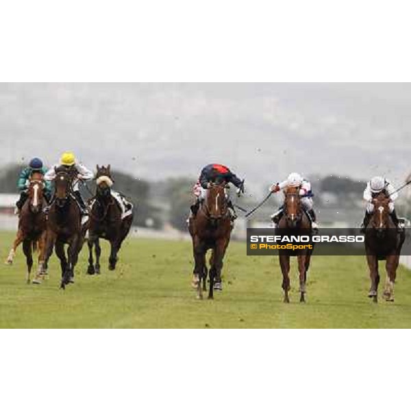 Carlo Fiocchi on United Color wins the Premio Tudini.Cristian Demuro on Traditional Chic is second.Mirco Demuro on Pandar is third Roma - Capannelle racecourse, 20th may 2012 ph.Stefano Grasso