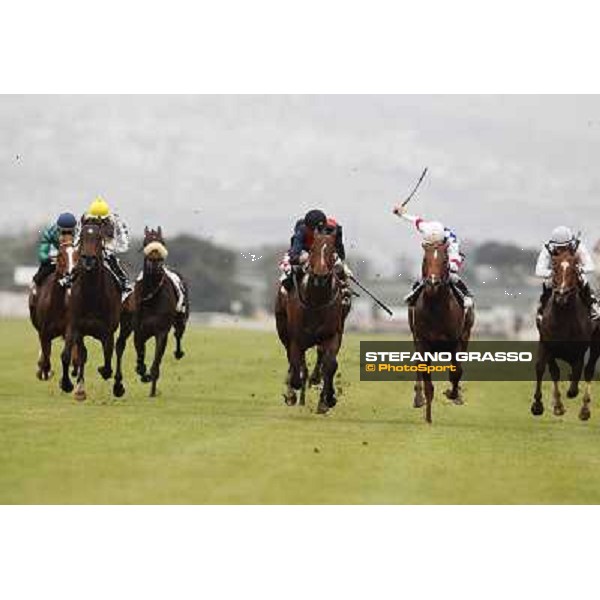 Carlo Fiocchi on United Color wins the Premio Tudini.Cristian Demuro on Traditional Chic is second.Mirco Demuro on Pandar is third Roma - Capannelle racecourse, 20th may 2012 ph.Stefano Grasso