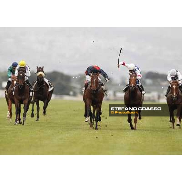 Carlo Fiocchi on United Color wins the Premio Tudini.Cristian Demuro on Traditional Chic is second.Mirco Demuro on Pandar is third Roma - Capannelle racecourse, 20th may 2012 ph.Stefano Grasso