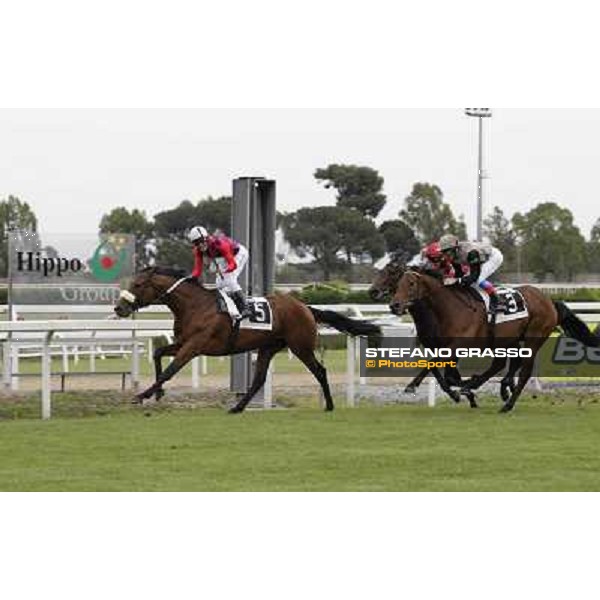 Cristian Demuro on Lake Drop goes to win the Premio Carlo D\'Alessio. Frankie Dettori on Frankenstein is second.Carlo Fiocchi on Branderburgo is third Roma - Capannelle racecourse, 20th may 2012 ph.Stefano Grasso