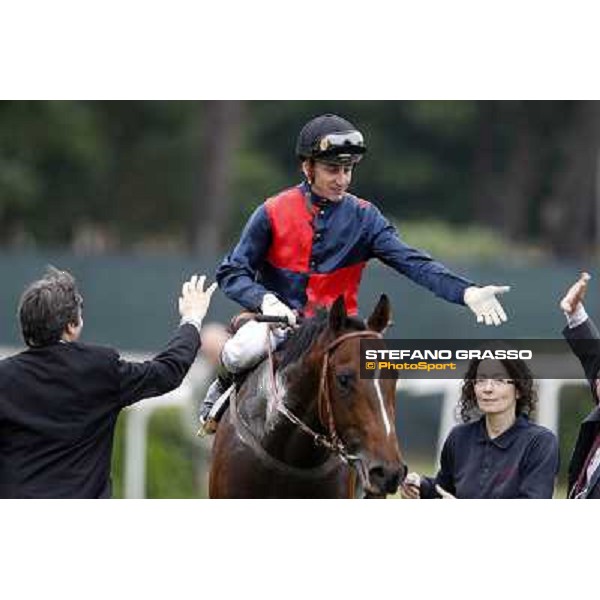 Matteo Limata and Riccardo Menichetti congratulate with Carlo Fiocchi returning home on United Color after winning the Premio Tudini. Roma - Capannelle racecourse, 20th may 2012 ph.Stefano Grasso